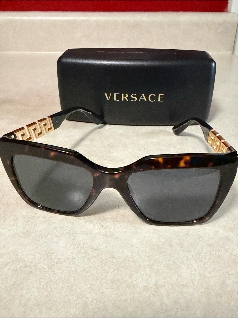 Versace Women’s Tortoise Frame Sunglasses with Gold Temple Detail
